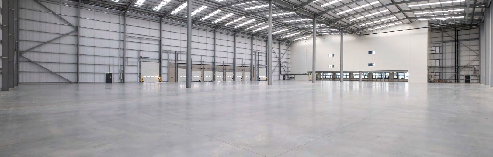 Warehouse interior showing the clear internal height and dock doors